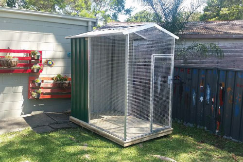 Animal Enclosures - Bird avery with an open area for the birds to fly and an enclosed area for them to get out of the weather by New Look Shed City