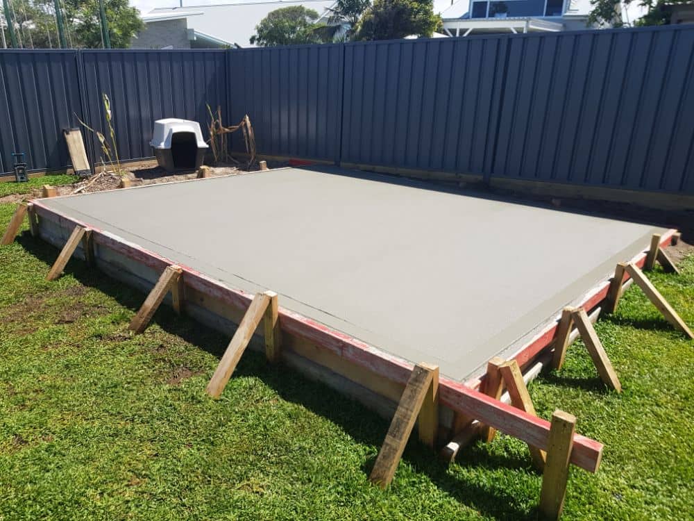 Shed Flooring Systems - Concrete slab day of pour by New Look Shed City