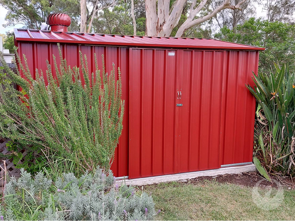 Custom Colorbond Garden Sheds built and installed by New Look Shed City. Deluxe 3.86 x 3.10 gable shed with double sliding doors in Manor Red.